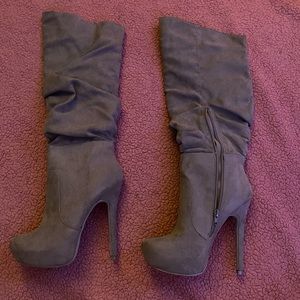 Knee high, heeled boots